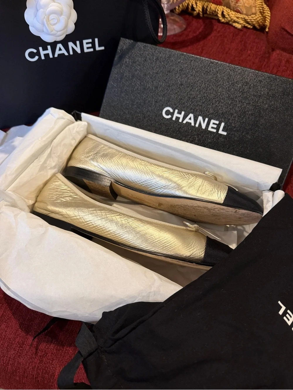 CHANEL Gold Leather Ballet Flats with Black Cap Toe Winter 2025 Season